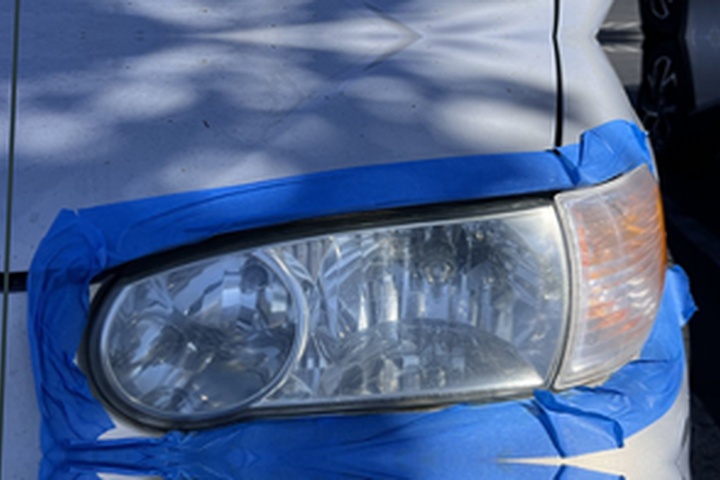 Silver Toyota sedan headlight after ANHEM restoration