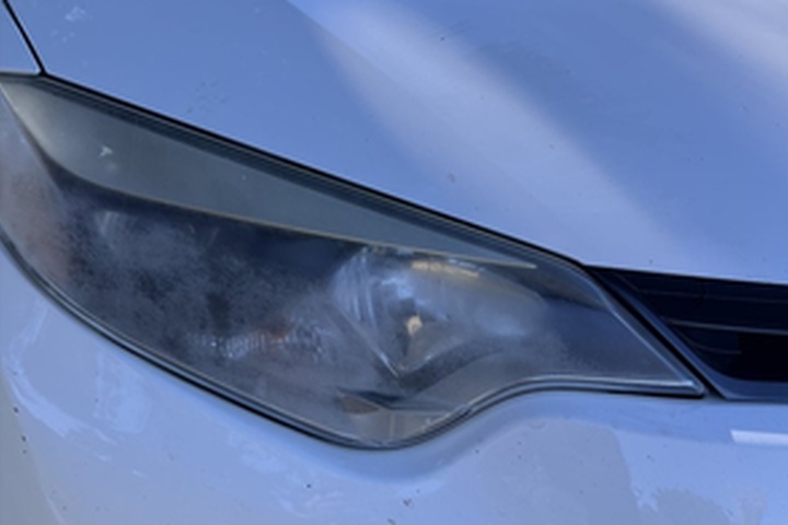 Toyota Corolla headlight before ANHEM restoration