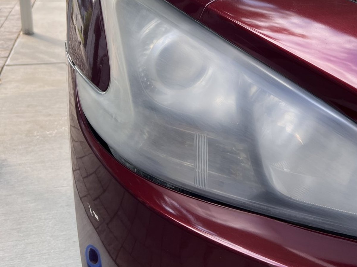 ANHEM sanding stage showing the headlight intentionally matte after sanding